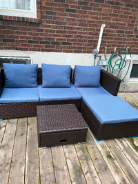 Beautiful Patio Sectional with blue cushions