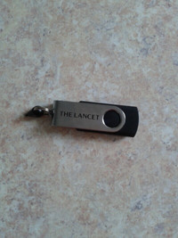 4 BrandNew Sealed Videotapes $8+New Lancet USB Stick, 3.77 GB $8