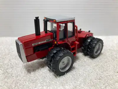 1/64th MASSEY FERGUSON 4840 4wd tractor produced by ERTL in 2022. This is #5 in the Evolution Series...