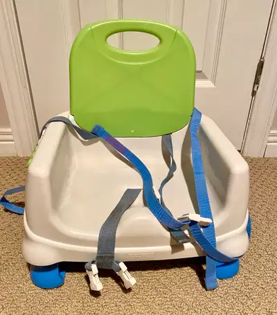 Fisher Price Portable Booster Seat High Chair. White, green and blue with blue straps. Measures 13 x...