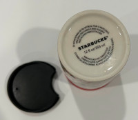 Starbucks travel mug with lid. Like new condition.