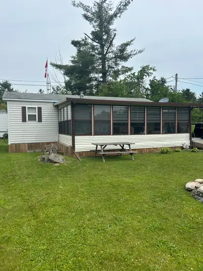 2005 Forest River Park Model 38’ x 12' complete with 16’ x 24’ prefab add a room, large deck with me...