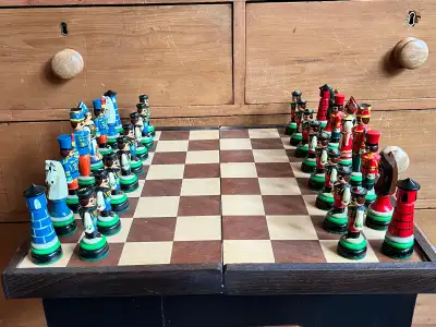 Beautifully handpainted Hungarian folk art rare vintage chess set. Pieces store in folding board whi...