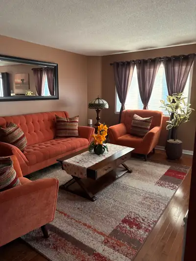 For sale oversized couch and 2 matching chairs in excellent condition....Includes 4 throw pillows .....