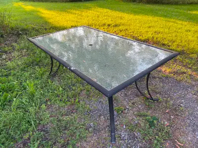 I can’t give this away? Glass top, brown metal frame. 42" x 72".