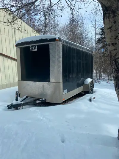 6x12 Cargo Mate trailer with tie down strips. Trailer is located in St. Paul County. Selling to get...