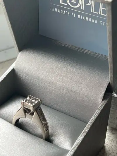 Matching pair with life time warranty purchase price $4386. Wedding ring never worn engagement ring...