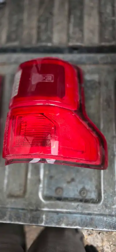 I am selling a used ford tail light. It has some minor scratches but is in overall good working cond...