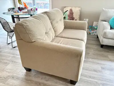 Ashley "Laryn" love seat in khaki pet/smoke free home, View more