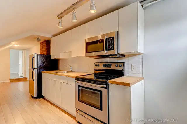 Bright 3rd Floor Apartment for Rent – Bathurst & Dupont