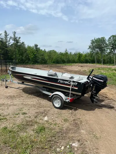 2013 16ft Aluminum fishing boat package with trailer and 20hp outboard 4 stroke mercury motor. Motor...