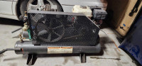 Wheel barrow style gas compressor 