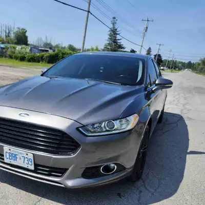 I'm selling my 2013 Ford Fusion SE 2.0T, a fully loaded sedan that offers both style and performance...