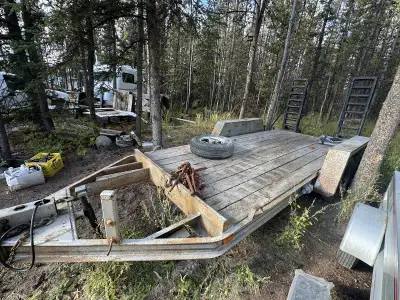 14 foot deck Very solid 5500 lbs axles one is new Comes with spare tire and rim Comes with few boome...
