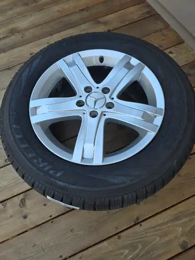 Mercedes Dealer rims 17 inch. Pirelli Scorpion tires 235 65R 17 . Mint condition used One Season. St...