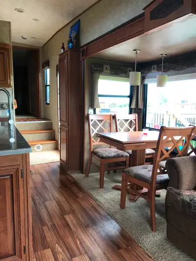 2014 Sabre 5th Wheel Trailer Model 34CKQS-6 4 Slide, Couch opens up to double size bed, fireplace, I...