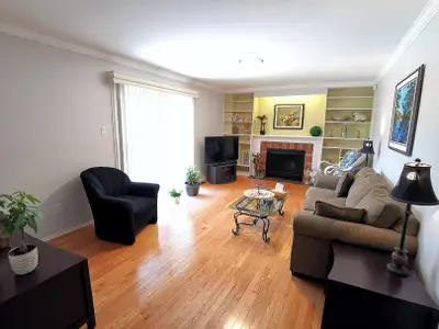 This is a quiet clean all hard wood floor bright house with 3.5 bathrooms to share. It is a nice med...