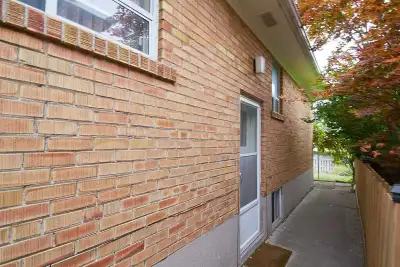 Fully renovated lower-level suite with separate side entrance. Includes 2 bedrooms + den with single...