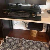 IKEA office desk for sale with added standing desk riser