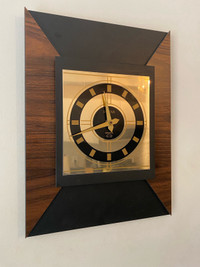 Vintage rare Bulova quartz wall clock.16”x12”.