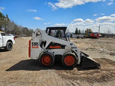 I'm selling a used Bobcat S185 skid steer loader, known for its reliability and robust performance....