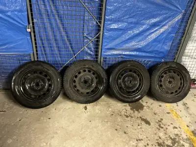 Continental wintercontact 205/55R16 tires with steel wheels package. In great shape with lots of tre...