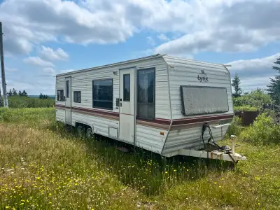 For parts or repair, 28’ travel trailer. Had a leak in the back bedroom and the ceiling has been ope...