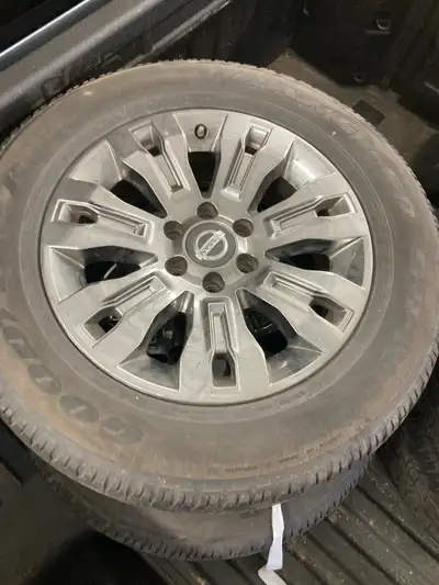 Nissan truck wheels and tires wheels are in great shape I will have them cleaned up before sale and...