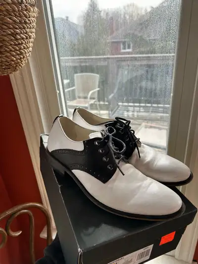 white and black dress shoes, View more