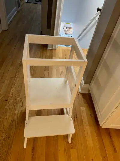 Toddler kitchen learning tower - fits nicely under bar height kitchen counter. less than one year ol...