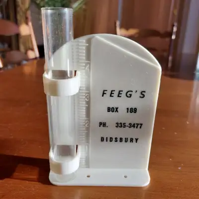 NEW NEVER USED FEEGS' DIDSBURY RAIN MEASUREMENT. MADE OF GLASS AND PLASTIC. ASKING $10.00 OBO