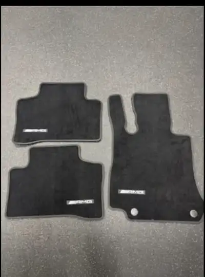 THREE new, never used factory AMG floormats. Driver and 2 rear. *Missing front passenger mat* $40 ob...