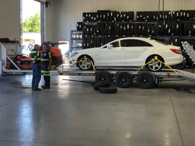 28' all steel 5th wheel tri-axle flatbed trailer with beavertail and heavy equipment ramps. Complete...