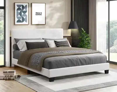 This full-size Queen bed frame is upholstered in a stylish white fabric, offering a modern and clean...