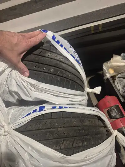 Get ready to roll with these Michelin Defender tires, size 225/65R17, perfect for all-season driving...