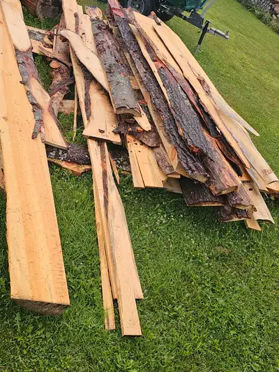 Fresh sawn pine slabs for firewood. Approximately 20" long. $25/car load. $50/truck or trailer load.