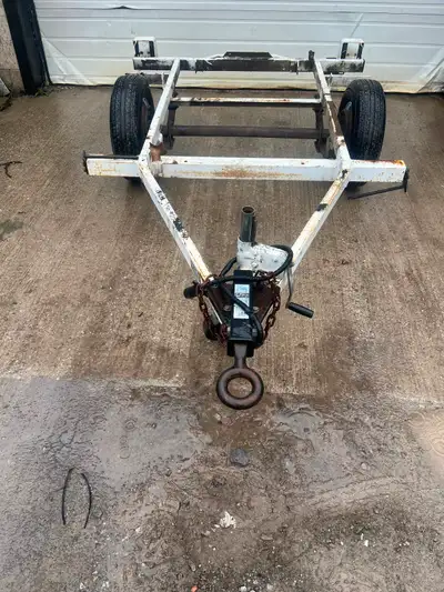Small trailer frame. 10 ft overall length. 391/2 inch frame width with axle and springs attached 60...