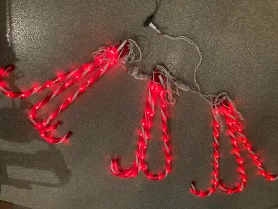 Illuminated Candy Canes-$8.00 per bundle or $20.00 for all. 3 bundles of candy canes. 3 candy canes...