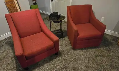 Set of red fabric comfy chairs. 1 is a swivel chair, both in great shape? pick up only . $450.00 obo...