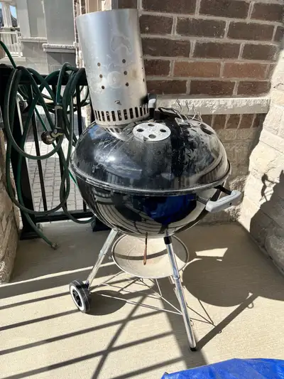 Weber BBQ with accessories hook and chimney starter, View more