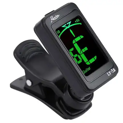 New in box clip-on instrument tuner (guitar, bass, violin, ukulele, chromatic). Includes battery.