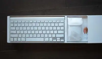 Brand New Apple wireless Bluetooth keyboard and wireless mouse ... still wrapped and in the box.