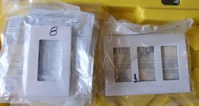 Lot of 9 Leviton screwless cover plates, View more