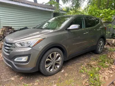 2013 Hyundai Santa Fe Sport 2.0L Turbo AWD with 107000km. Engine is making noise/knocking. 1 Owner,...