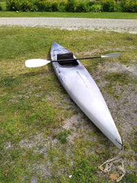 Kayak (purple) with paddle