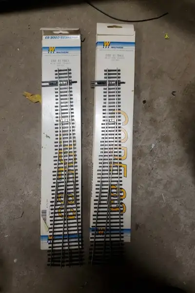 Two unused Walthers Code 83 #8 right hand turnouts. For a DC layout. Would require a conversion for...