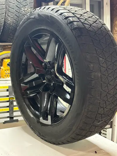 Used one season, rims are mint, have Chevy center caps and sensors on valve stems.