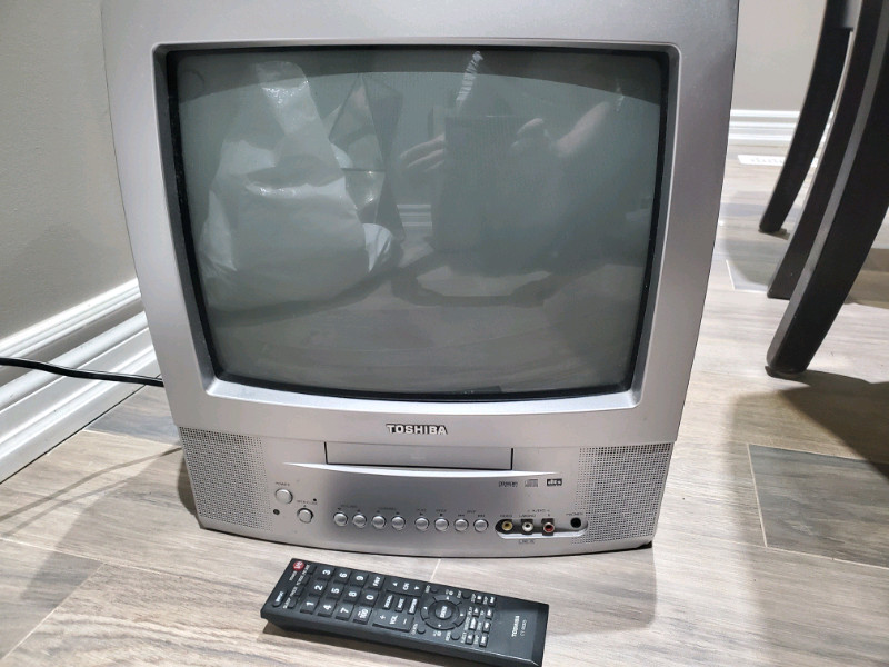 13" Toshiba tube TV (CRT) with builtin DVD player and remote. TVs