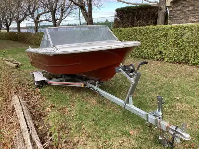This is a fibreglass Peterborough from the 70s. it is over 13 feet long and 5 feet wide. The fibregl...