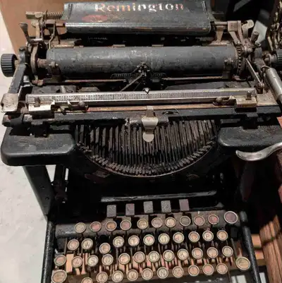 Step back in time with this vintage Remington typewriter, a true piece of history! While this typewr...